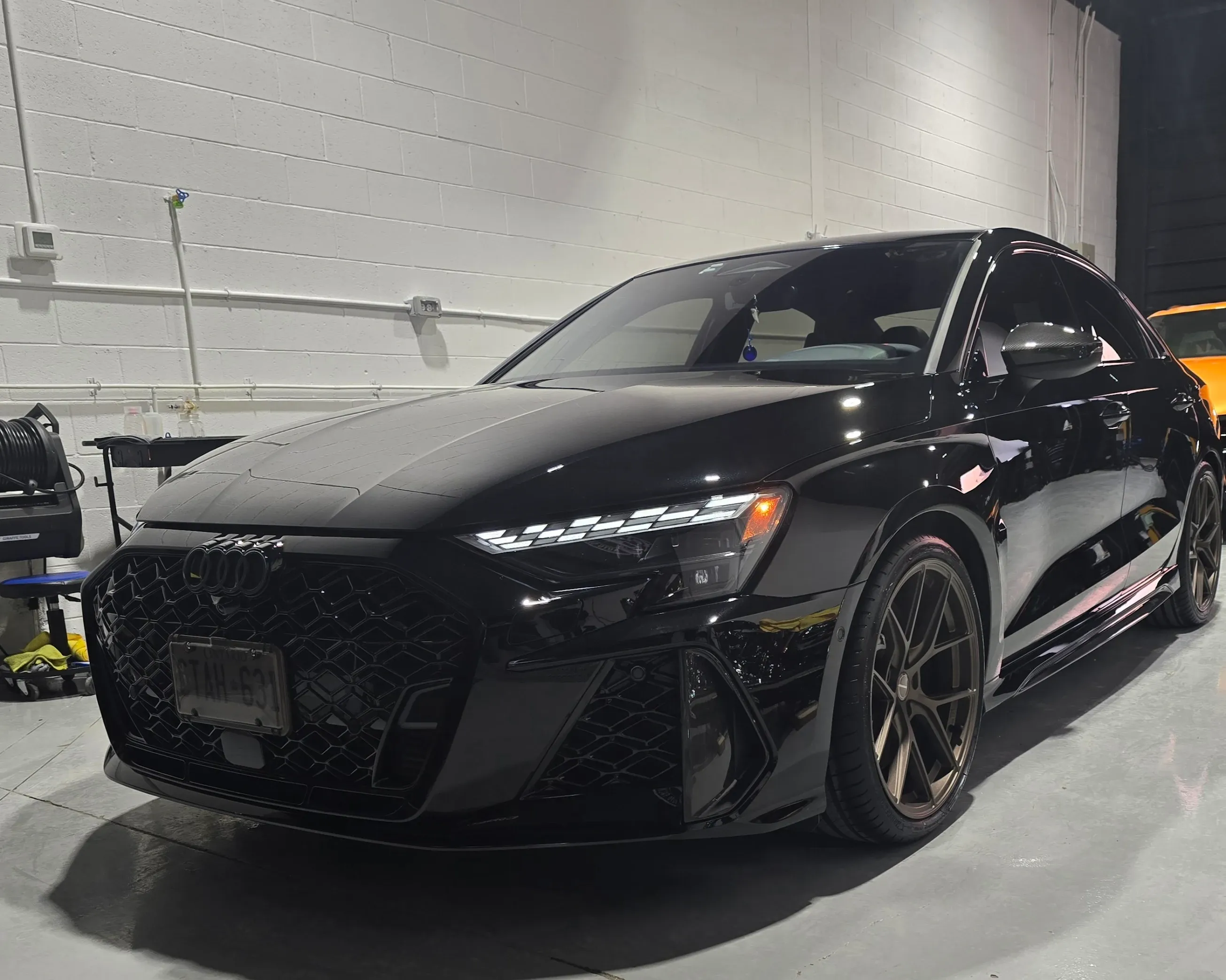 Audi RS3 front three-quarter after ceramic coating and polish